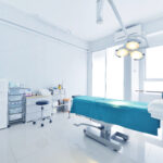 An interior view of a clean operating room in a trusted cervical disc fusion surgery center.